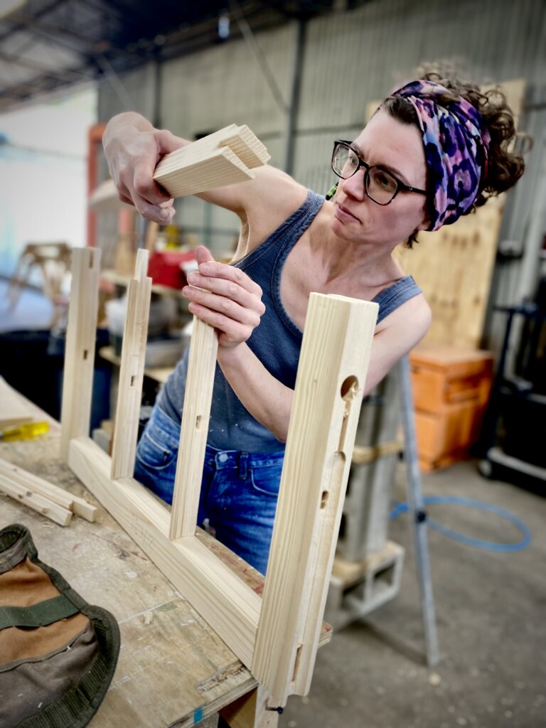 Woman making a divided lite sash as part of a sash making course